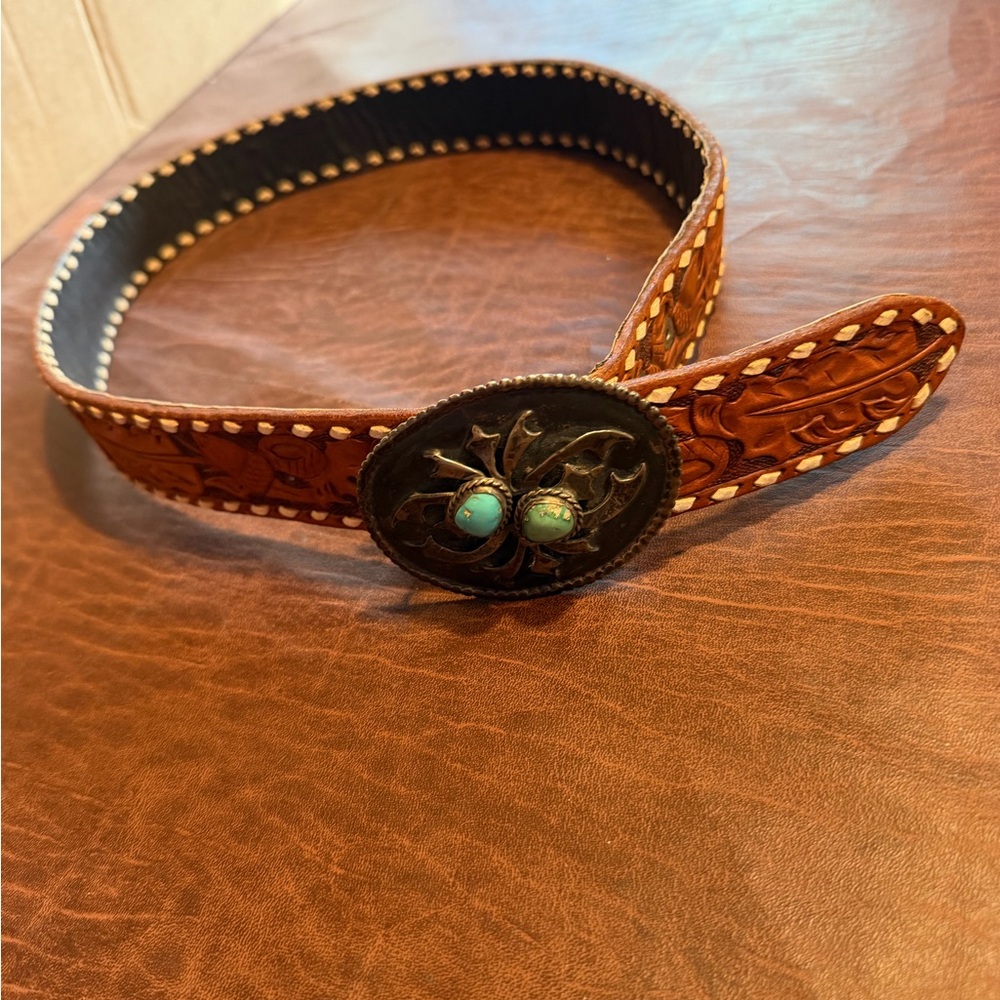 Navajo handmade silver with turquoise belt buckle and embossed leather belt